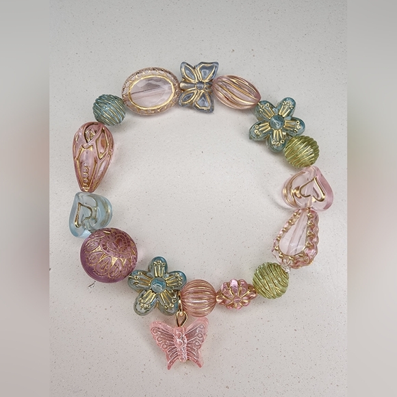 Alla Shevchenko Jewelry - Acrylic baroque beaded bracelet, butterfly charm